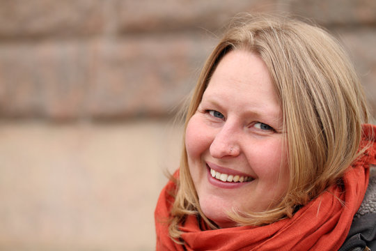 Warm portrait of a happy authentic woman