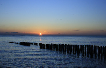 Obraz premium Sonnenuntergang an der Küste in Zeeland