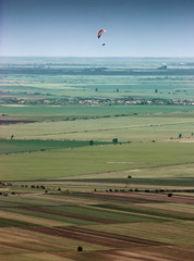 Paragliding over the endless fields