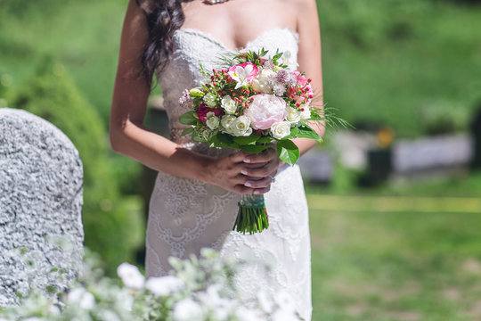 bride holding wedding bouquet