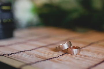 Wedding rings on a bamboo napkin