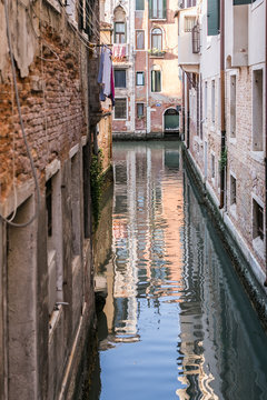 colorful canal in Venice at sunset