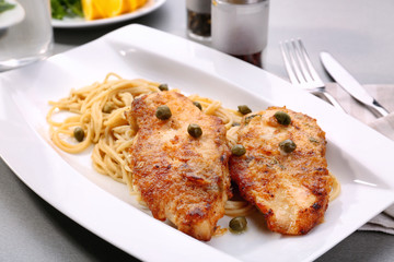 Delicious Italian chicken piccata on plate