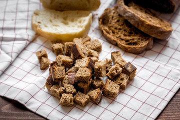 making crumbs from rye bread wooden background