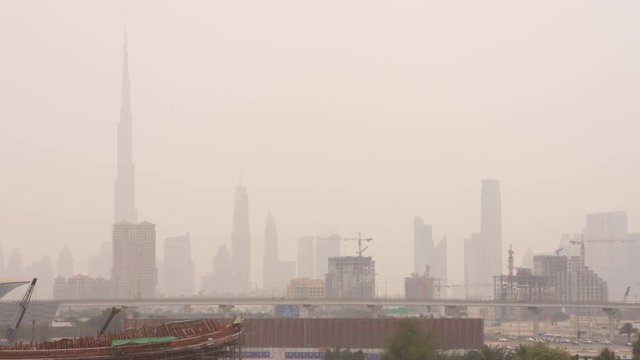 the skyline of Dubai on a cloudy day. DUBAI, May 2016