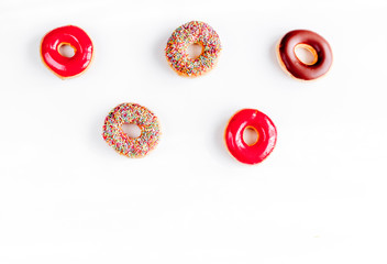 food design with donat set on white table background top view mockup
