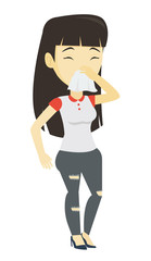 Young asian sick woman sneezing.