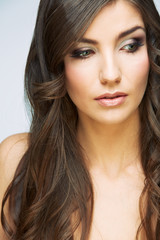 Obraz premium Young beauty woman face close up portrait. Female model with long hair.