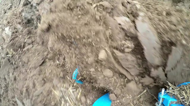  Camera on a plow of a tractor on a acre