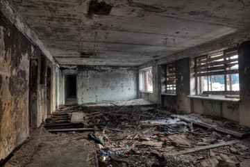 Interior view of the destroyed room in an abandoned house