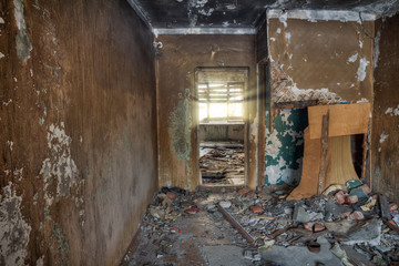 Interior view of the destroyed room in an abandoned house