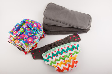 Washable baby diapers and inserts for them