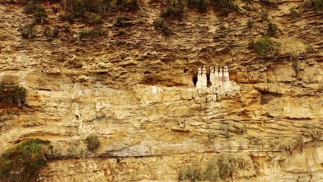 Aerial of carajia. Sarcophagi of the Chachapoya culture in Peru, South America. Mummies located in the figures hight in cliffs