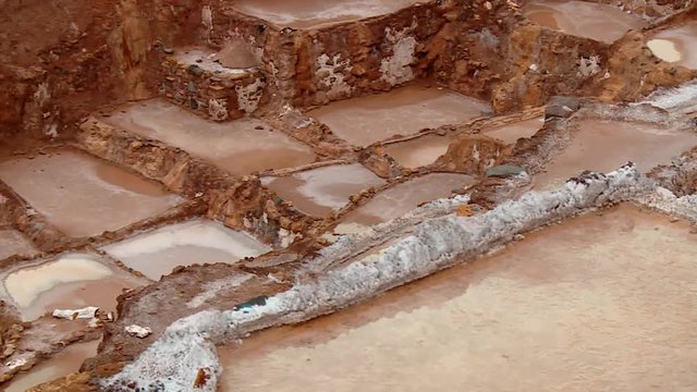 PERU: Salt evaporation pond in Maras. Video footage from South America, Peru. 