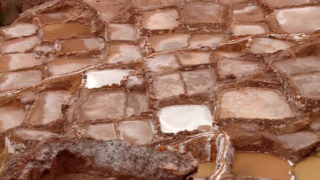 PERU: Salt evaporation pond in Maras. HD Video footage from the Andes of Peru, South America