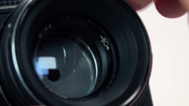 Photographer Adjusts the Aperture in the Retro Camera. 4K