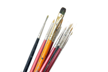 Obraz premium Paints and brushes isolated on white background