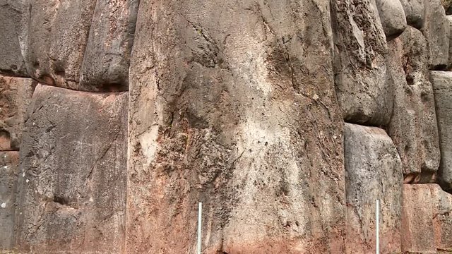 Sacsayhuaman in the Inka city Cusco in Peru. Close up video footage from the stones in a wall. 
