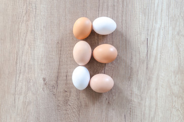 Happy Easter on wooden table