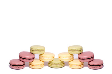 Colorful macaroons. pyramid of macaroons Sweet macarons. Isolated on white background. a pyramid of macaroons