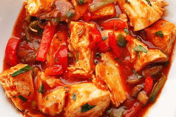Plate with tasty chicken cacciatore, closeup
