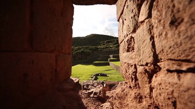  window in a wall at the ruins of Tip�n (Inca ruins). Cusco, Andes of Peru, South America