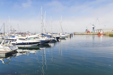 Fototapeta na wymiar Yachts moored in Vilagarcia de Arousa harbor