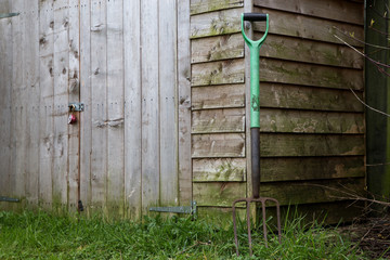 Old Garden Shed and Rusting Garden Fork