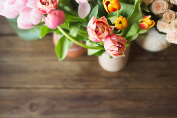 Pink tulips on the wooden background. Pink tulip. Tulips. Flowers. Flower background. Flowers photo concept. Colored tulips. Petals. Narcissus