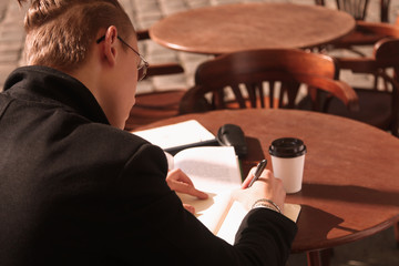 businessman planning his workday. Time management concept. (Freedom, freelance, success, money)