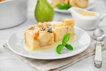 Delicious bread pudding with fruits on plate