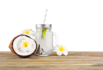 Beautiful composition with coconut water on white background