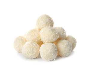 Coconut candies on white background