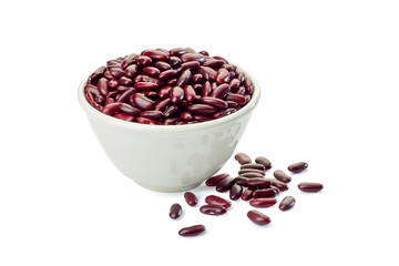 Bowl of raw red beans on white