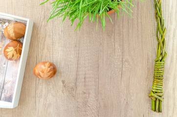 Happy Easter on wooden table