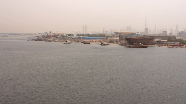 the skyline of Dubai on a cloudy day