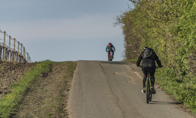 Obraz premium Bikers in slope near Strachotin and Popice villages