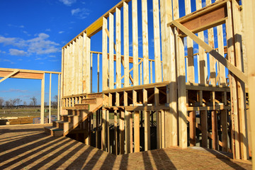 New wood frame home under construction.