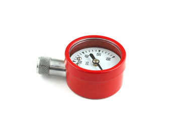 Red pressure checking gauge on white background