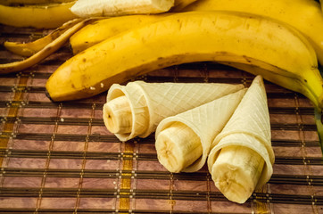 Ripe banana. Wafer cups. Dessert for a snack