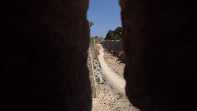 embrasure in the fortification in the old city of Rhodes, Greece