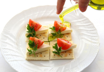 Cheese biscuits with tomatoes and oil