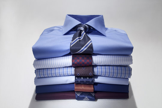 Man's shirt and tie, folded and stacked