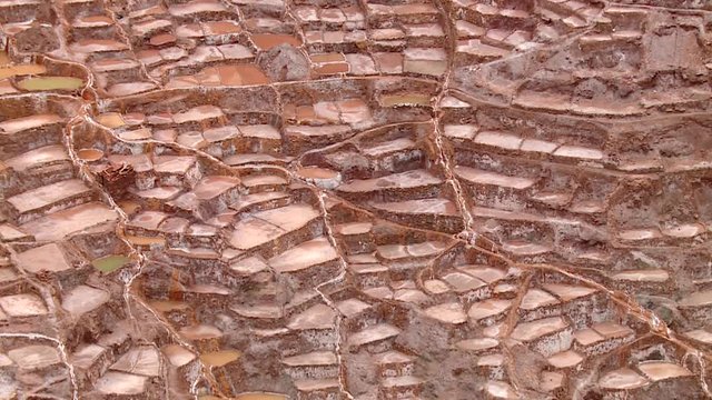PERU: Salt evaporation pond in Maras. HD Video footage from the Andes of Peru, South America