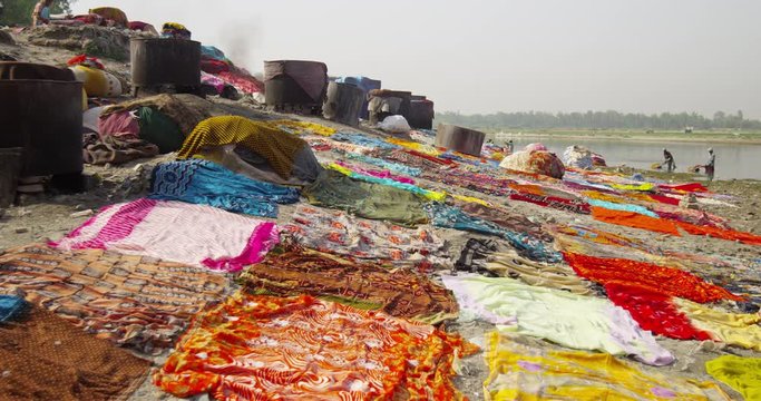 Dhobi Ghat (laundry by hand) using the Yamuna to wash traditional Indian garments