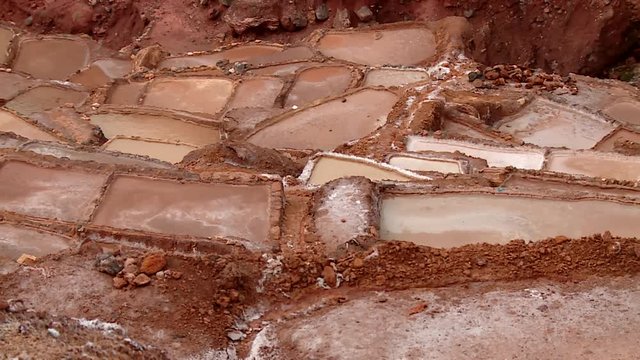 PERU: Salt evaporation pond in Maras. Video footage from South America, Peru. 