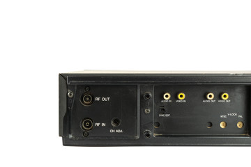 Obraz premium back side panel of old video cassette tape player on white background