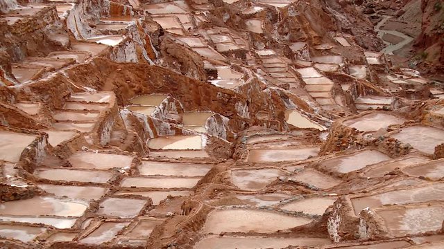 PERU: Salt evaporation pond in Maras. HD Video footage from the Andes of Peru, South America