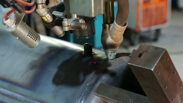  Flux-cored arc welding. Machine welding in a fabric