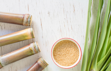 Close up sugarcane,Sugar cane on wood background.Close up Sugar cane on wood background.